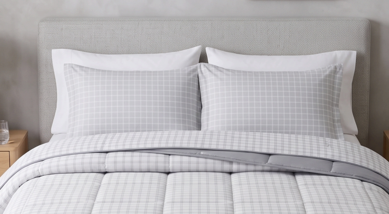 Roupas de cama, mesa e banho dobradas